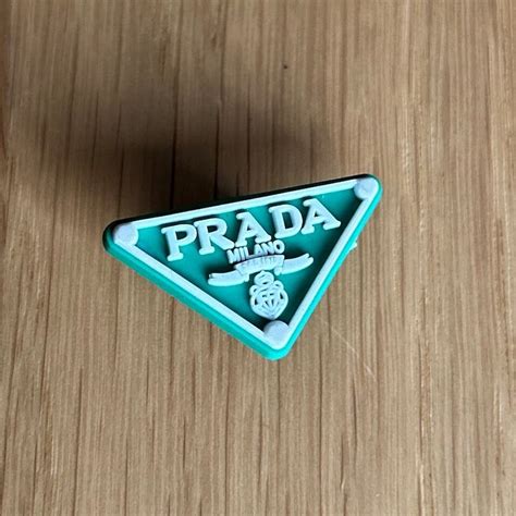 crocs charms prada